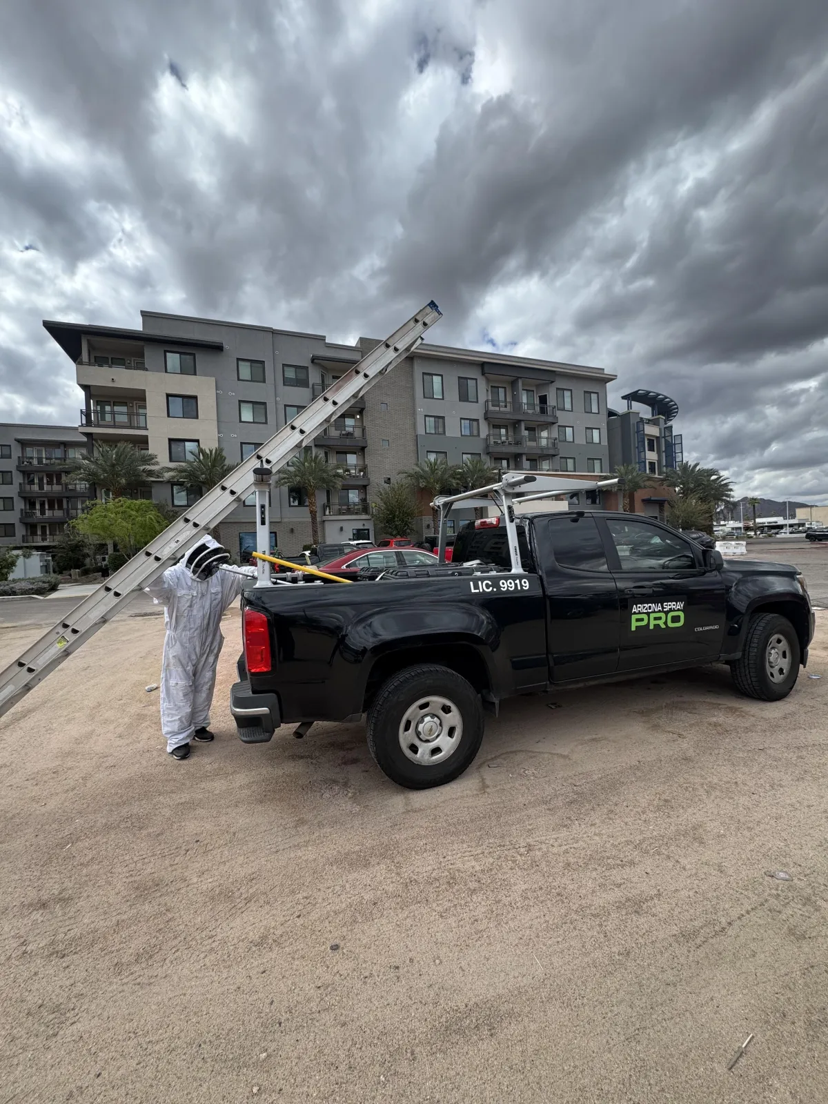 AZ Spray Pro service truck at a multifamily commercial property